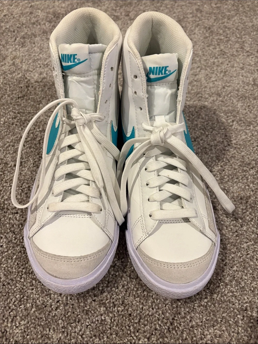 Nike White High-Top Sneakers with Teal Swoosh Accents